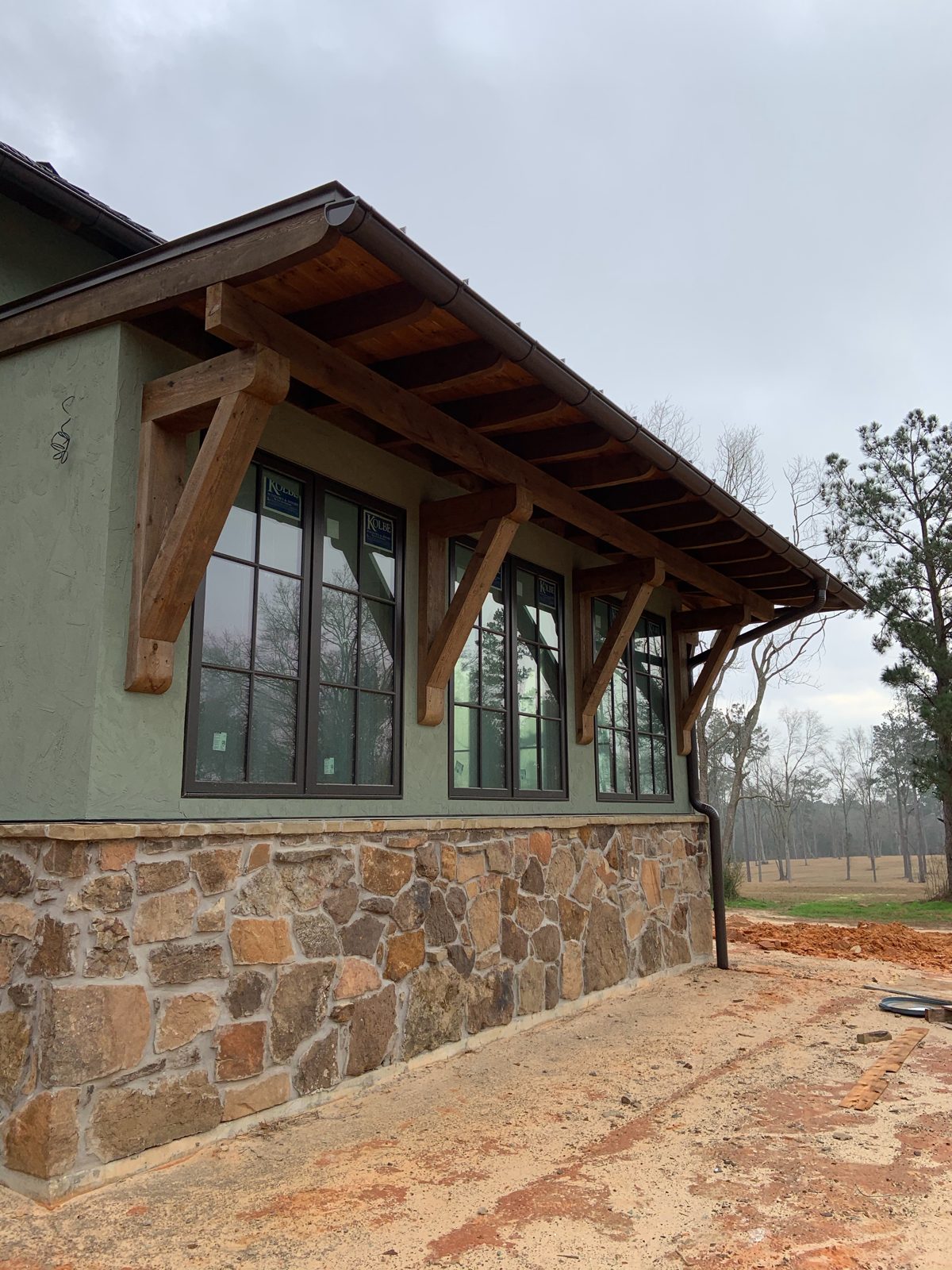Timber brackets and exposed rafters